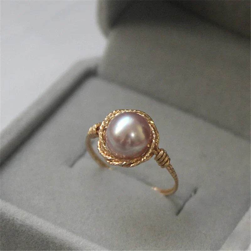 Purple Pearl Ring: A stunning accessory to elevate your style effortlessly.