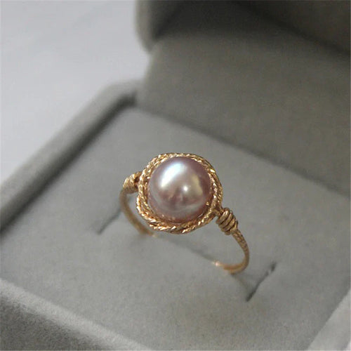 Purple Pearl Ring: A stunning accessory to elevate your style effortlessly.