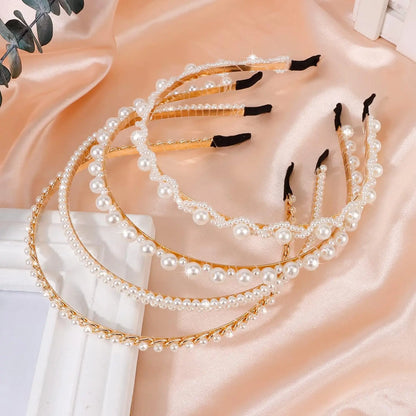 Elegant Pearl HairbandElegant Pearl Hairband: A timeless accessory for a touch of sophistication.